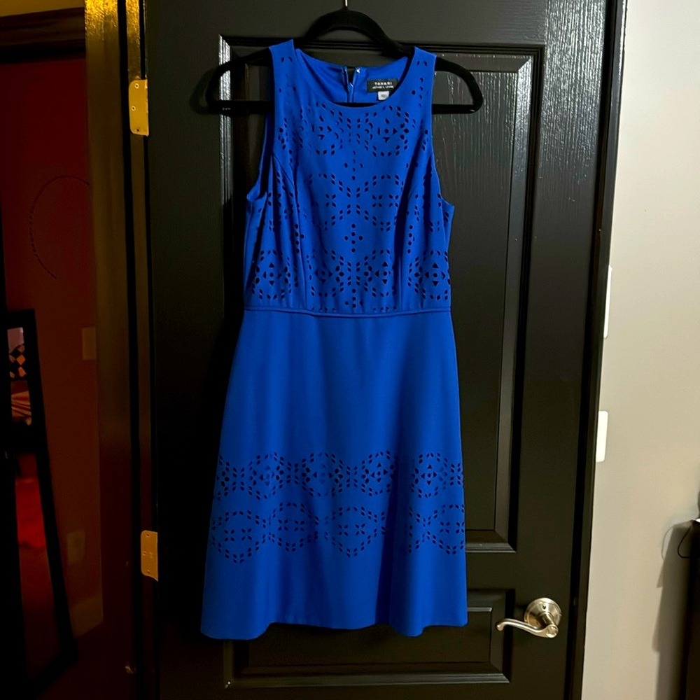 Blue laser cut Tahiti dress size 8 new without tags